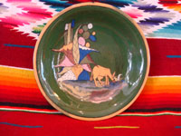 Mexican vintage pottery and ceramics, a lovely green-ware plate with a graceful deer amidst foliage, Tlaquepaque, Jalisco, c. 1930's. Main photo of plate.