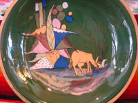 Mexican vintage pottery and ceramics, a lovely green-ware plate with a graceful deer amidst foliage, Tlaquepaque, Jalisco, c. 1930's. Another photo of the grazing deer.