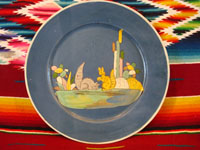 Mexican vintage pottery and ceramics, a lovely blue-ware plate with two playful squirrels, Tlaquepaque, Jalisco, c. 1930's. The artwork is extremely crisp, and the scene is lovely and extremely endearing!