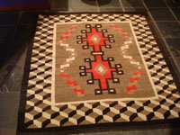 Native American Indian antique textiles, and Navajo vintage blankets and rugs, a stunningly beautiful antique Navajo rug with an eye-dazzling border and wonderful design and colors, Arizona or New Mexico (very possibly Ganado, Arizona), c. 1930-40's. Main photo of the Navajo rug.