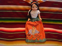Vintage Mexican folk art, a lovely "China Poblana" folk art doll with a beautiful face and wonderful sequins on her dress, depicting the Mexican eagle, c. 1940's. Main photo of the doll.