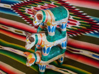 Mexican vintage folk art, and Mexican vintage pottery and ceramics, a wonderful pottery figure of bulls stacked on top of one another, in the form of a tree-of-life, Acatlan, Puebla, c. 1940's.  Main photo of the stacked bulls.