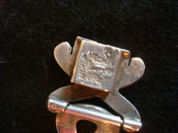 Mexican vintage sterling silver jewelry, and Taxco vintage sterling silver jewelry, a graceful and very beautiful sterling silver bracelet, signed on the back with the stamp of Marisela, Taxco, c. 1940's. Photo showing the back of the clasp with the stamp of the maker, Marisela of Taxco.