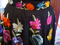 Closeup photo of the embroidery on the skirt.