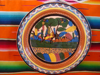 Mexican vintage pottery and ceramics, a beautiful petatillo charger with a central scene of a burro setting off for the mercado, loaded with merchandise, Tonala or San Pedro Tlaquepaque, c. 1930's.  Main photo of the petatillo charger.