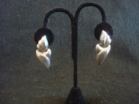 Mexican vintage sterling silver jewelry, and Taxco vintage silver jewelry, a lovely pair of dangling silver earrings with fine repousee silverwork, Taxco, c. 1950's. Main photo of the Taxco silver jewelry earrings.
