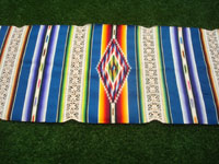 Mexican vintage textiles, and Mexican vintage serapes (sarapes), a Saltillo-style runner with incredible colors, with bands of teneriffe (croche-work resembling fine lace) and a fabulous center medallion, c. 1930-40's.  Closeup photo of the center medallion.