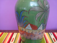 Mexican vintage pottery and ceramics, a lovely pottery vase with a wonderful green background and beautiful artwork, Tonala or San Pedro Tlaquepaque, c. 1930's. Closeup photo of another side of the vase showing a rural house.