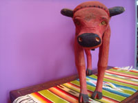 Mexican vintage folk art and woodcarvings, a wonderful carved wooden bull, by the great folk artist Manuel Jimenez, Arrazola, Oaxaca, c. 1960. Photo of the bull's face.