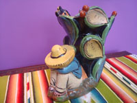 Mexican vintage pottery and ceramics, and Mexican vintage folk art, a wonderful pottery vase depicting a snoozing Mexican paisano resting amidst beautiful beaver cacti, Tonala or San Pedro Tlaquepaque, c. 1940's.  Main photo of the snoozing man.