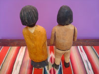 Mexican vintage folk art, a wonderful woodcarved Mixtec couple attributed to the great Manuel Jimenez of Oaxaca, c. 1950's.  Photo of the back side of the couple.