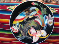 Mexican vintage pottery and ceramics, a charger decorated in art-deco style with a very lovely exotic bird, Tlaquepaque, Jalisco, c. 1950's. Main photo of charger.