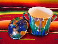 Mexican vintage pottery and ceramics, a lovely drip-ware lidded bowl, often referred to as Mexican majollica, Oaxaca, c. 1930's. The glaze, which appears to be "dripped" over the bowl, is thick and very rich. Photo showing the bowl with lid removed.