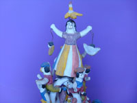 Mexican vintage pottery and ceramics, and Mexican vintage folk art, a wonderful tree of life attributed to the famous Heron Martinez, c. 1960's. Closeup photo of woman at the top of the tree.