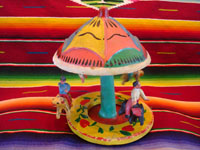 Mexican vintage pottery and ceramics, and Mexican vintage folk art, a wonderful merry-go-round with fantastic figures, attributed to Candelario Medrano, Santa Cruz de las Huertas, Jalisco, c. 1970's. Main photo of carousel.