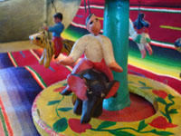 Mexican vintage pottery and ceramics, and Mexican vintage folk art, a wonderful merry-go-round with fantastic figures, attributed to Candelario Medrano, Santa Cruz de las Huertas, Jalisco, c. 1970's. Closeup photo of one of the riders.