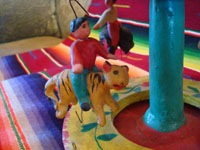 Mexican vintage pottery and ceramics, and Mexican vintage folk art, a wonderful merry-go-round with fantastic figures, attributed to Candelario Medrano, Santa Cruz de las Huertas, Jalisco, c. 1970's. Another closeup of a rider.