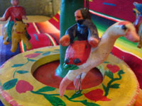 Mexican vintage pottery and ceramics, and Mexican vintage folk art, a wonderful merry-go-round with fantastic figures, attributed to Candelario Medrano, Santa Cruz de las Huertas, Jalisco, c. 1970's. Photo of another rider on a lovely swan.