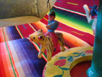 Mexican vintage pottery and ceramics, and Mexican vintage folk art, a wonderful merry-go-round with fantastic figures, attributed to Candelario Medrano, Santa Cruz de las Huertas, Jalisco, c. 1970's. Photo of another rider on a jaguar.