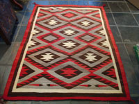 Native American Indian antique textiles, and antique Navajo rugs, a beautiful Navajo rug, in the Ganado style, c. 1930's. Main photo of the fine Navajo rug or weaving.