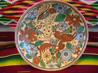 Mexican vintage pottery and ceramics, a tri-pod bowl with beautiful and very intricate artwork, signed by the famous artist, Antonio Rivera, Tonala or Tlaquepaque, Jalisco, c. 1930-40's. Photo shot from above the bowl looking down at the astounding artwork inside the bowl.