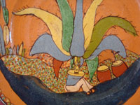 Mexican vintage pottery and ceramics, a beautiful pottery plate with a very finely painted scene of a Mexican campesino resting under his favorite maguey cactus, Tonala or Tlaquepaque, Jalisco, c. 1940's. Closeup photo of the resting campesino.