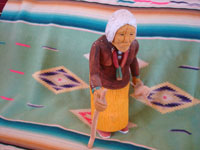 Native American Indian folk art and woodcarvings, a wonderful woodcarving of an old Navajo woman, signed by the great Navajo folk art woodcarver Johnson Antonio, Arizona or New Mexico, c. 1990. Main photo of the carving by Johnson Antonio.