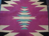 Native American Indian vintage textiles, and Navajo vintage rugs and textiles, a beautiful Navajo rug of fine Germantown woolen yarn, Arizona or New Mexico, c. 1900. A closeup photo of a central section of the textile.