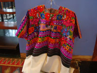 Guatemalan vintage textiles and huipiles, a beautiful Guatemalan huipil from Totonicapan with wonderful embroidered flowers around the yoke, c. 1980.  Main photo of the huipil.