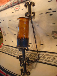 Mexican vintage folk art, and Mexican vintage tinwork and ironwork art, a lovely wrought iron wall sconce with a hand-blown amber glass shade, c. 1950's.  Main photo of the sconce.
