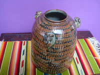 Mexican vintage pottery and ceramics, a beautiful pottery or ceramic jar with incredible metallic glazing of copper, deep blue, and burgundy, signed on the bottom by the famous artist, Jorge Wilmot, Tonala or San Pedro Tlaquepaque, c. 1970's. Main photo of the jar.