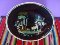 Mexican vintage pottery and ceramics, a lovely blackware pottery plate decorated with a wonderful deer, grazing amidst beautiful cacti, Tonala or San Pedro Tlaquepaque, c. 1930's. Main photo of the plate.