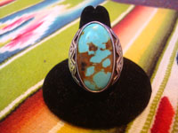 Native American vintage sterling silver jewelry, and Navajo sterling silver jewelry, a beautiful silver ring with a very fine turquoise stone (very possibly Kingman) and wonderful stamping on each side, very possibly a Fred Harvey piece, Arizona, c. 1940. Main photo of the ring.
