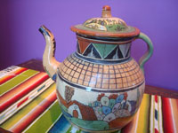 Mexican vintage pottery and ceramics, a beautiful petatillo (background cross-hatching resembling a straw mat or petate) tea pot with beautiful decorations. Tonala or San Pedro Tlaquepaque, c. 1930's. Photo of the second side of the tea pot.