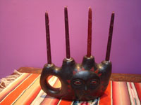 Mexican vintage folk art, a lovely blackware pottery candlelabra with a wonderful image of the sun on the front, Oacaca, c. 1950's. Main photo of the piece.