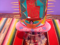 Mexican vintage devotional art, and Mexican vintage woodcarvings, a lovely woodcarving of Our Lady of Guadalupe, with fine detail in her robe and tunic, from the village of Tilcajete outside of the city of Oaxaca, c. 1980. Photo of the bottom half of the carving.