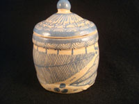 Mexican vintage pottery and ceramics, a jar with lid, signed Arias, with floral decorations, c. 1930-40. Beautiful cream colored glaze with blue floral decorations. Another view of the jar.