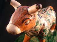 Mexican vintage pottery and ceramics, and Mexican vintage folk art, a pottery bull with fine hand-painted decoration, c. 1950. Signed on the bottom, Jose Trinidad Bernabe Lopez, Tonala, Jalisco Mexico.