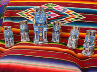Mexican vintage pottery and ceramics, a pulque or punch set with pitcher and 5 mugs in the form of Aztec gods, c. 1940. Wonderful blue glaze with hand-painted faces and decorations on each piece. Main photo.