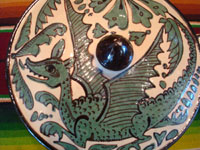 Mexican vintage pottery and ceramics, a fantasia-style lidded dish with fanciful dragon and fish, Tlaquepaque, Jalisco, c. 1930-40. Photo showing the dragon on the lid.