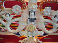 Mexican vintage pottery and ceramics and Mexican vintage folk art, a tree of life attributed to the master, Aurelio Flores, c. 1960. The piece has wonderful and soft patina, and is exquisitely painted and decorated with fanciful human figures, angels, birds and flowers. Closeup of the figure of a woman on front of the tree of life.