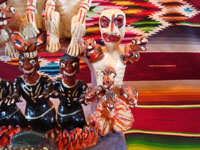 Mexican vintage folk art, and Mexican vintage pottery and ceramics, a wonderful Day of the Dead sculpture from the folk art center of Ocumicho, Michoacan, c. 1970's. Another closeup photo of one of the figures.