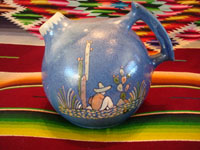 Mexican vintage pottery and ceramics, a stunning pottery pitcher with incredibly fine artwork, Tlaquepaque, Jalisco, c. 1920-30. The pitcher features a lovely soft-blue background, and the artwork features Mexican campesinos with cacti. Main photo of the Tlaquepaque pottery pitcher.