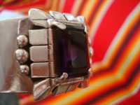 Native American Indian sterling silver jewelry, and Navajo sterling silver jewelry, a beautiful silver bracelet with a wonderful amethyst stone, signed Carl Quintana, Arizona or New Mexico, c. 1960's. Another side view of the bracelet and amethyst stone on the front.