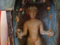 Mexican vintage devotional art, a wonderful statue of the Nino Perdido, a highly venerated image of the Christ Child, in a wonderful nicho which serves as the carrying case for the figure of the Nino, Mexico, c. 19th century. Closeup photo of the Nino.