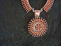 Native American Indian sterling silver jewelry, and Navajo and Zuni silver jewelry, a beautiful Zuni petite-point necklace with lovely coral and opal, Zuni Pueblo, New Mexico, c. 1950's.  Closeup photo of the medallion.