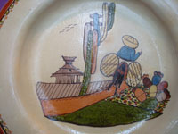 Mexican vintage pottery and ceramics, a beautiful pottery plate with wonderful artwork, Tonala or San Pedro Tlaquepaque, Jalisco, c. 1940's. Closeup photo of the artwork on the charger.