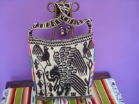 Mexican vintage textiles and sarapes, a beautiful woven wool shoulder bag or "morral" with the Mexican eagle with a snake in its beak on one side, and a caballero on his horse on the other side, Santa Teresa, Nayarit, c. 1950's. Main photo of the bag.