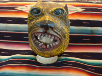 Mexican vintage wood-carving and folk art, a wonderfully carved and decorated helmet-style jaguar mask, used in dances and folk-festivals, from the Mexican state of Guerrero, c. 1950's. Main photo of the front of the Guerrero jaguar mask.
