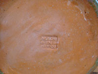 Mexican vintage pottery and ceramics, a wonderful pottery pulque pitcher from Tlaquepaque, Jalisco, c. 1930's. Photo of the stamp, Made in Mexico, on the bottom of the pitcher.